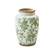 Cracked porcelain vase with floral pattern