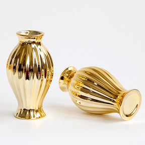 Miniature golden ceramic vase