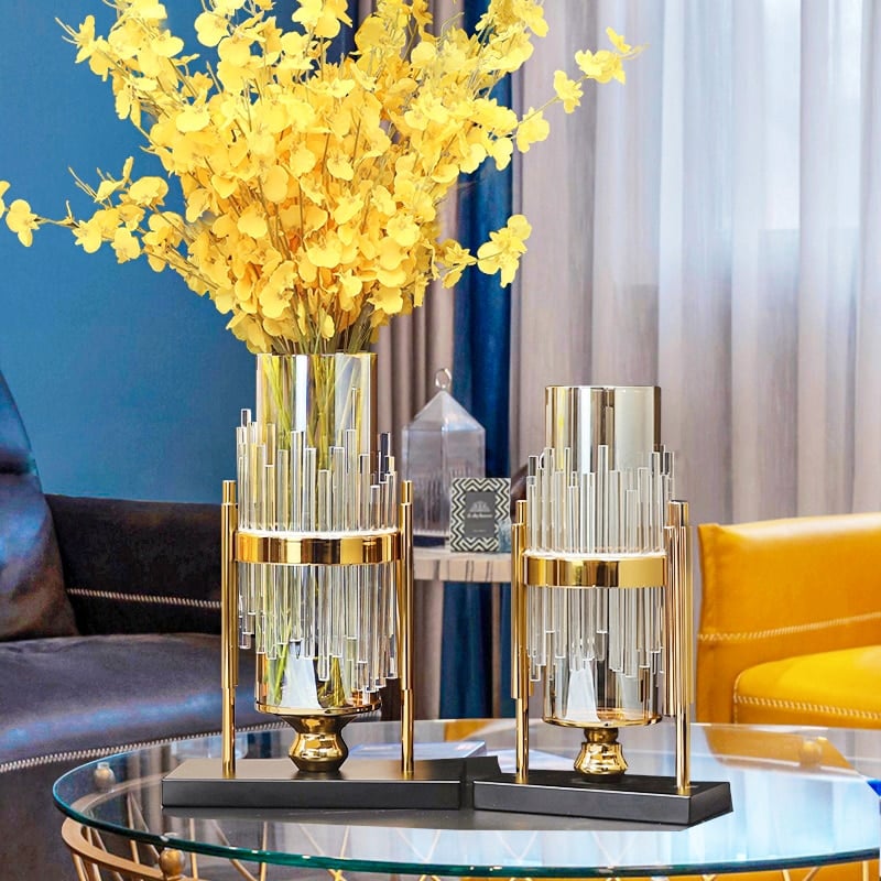 Modern transparent vase in glass tube and gold support