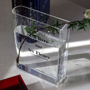 Original vase in the shape of a transparent book