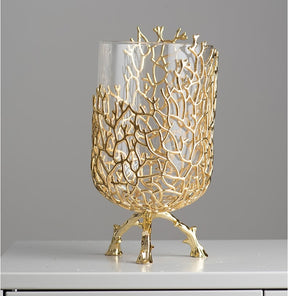 Transparent glass vase and golden coral frame