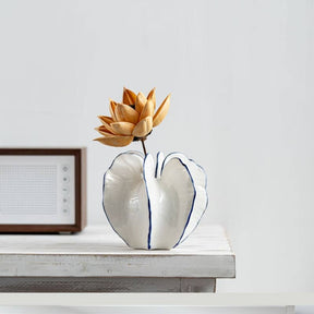 White ceramic vase in star fruit