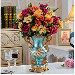 Vintage vase with gilding and floral pattern
