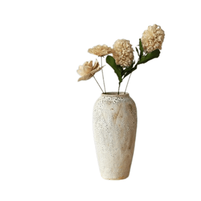Beige stoneware vase with small bubbles
