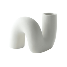Twisted white ceramic vase