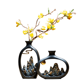 Japanese black openwork Zen style vase